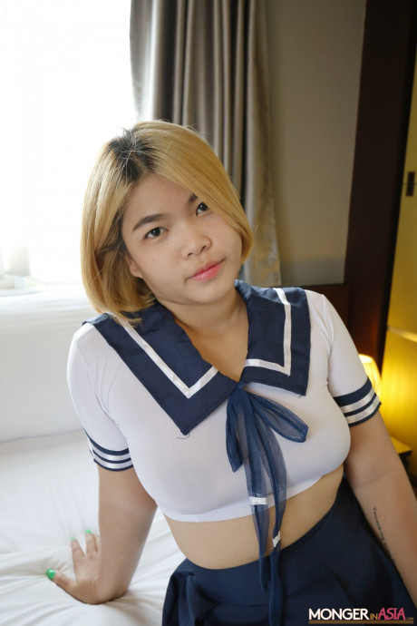 Pretty asian schoolgirl shows her pretty melons & her creampied pussy