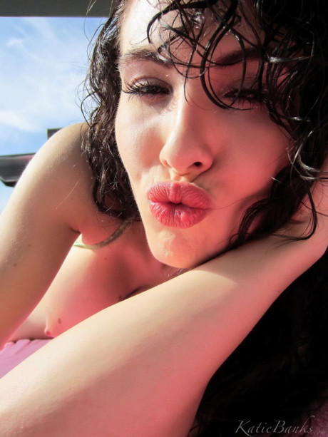Amateur female Katie Banks bares her knockers while taking bikini selfies