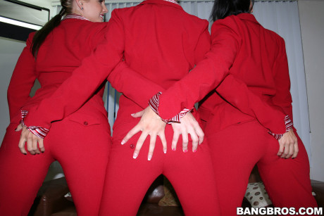 Fine stewardesses exposes their wonderful bums and huge boobies together