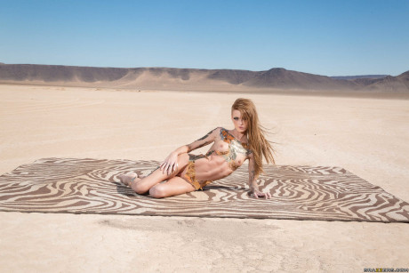 Exotic flexible American Kimber Veils engages in hot sex action in the desert