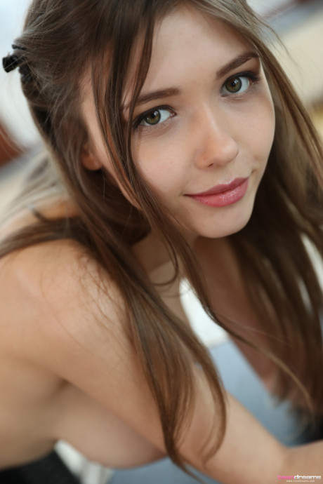 Ukrainian young with monstrous titties Mila Azul strips & poses nude by the window