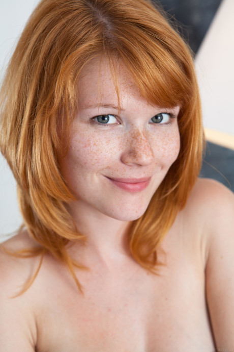Czech teen Mia Sollis displays her pretty freckled face & bald snatch up close