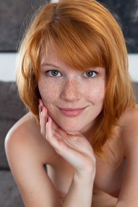 Czech teen Mia Sollis displays her pretty freckled face & bald snatch up close