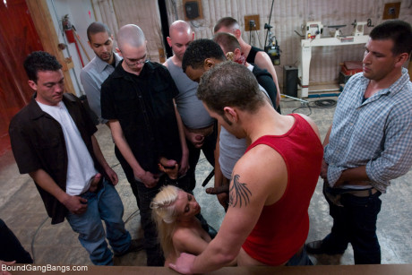 Submissive nympho Lorelei Lee gives oral pleasure to a bunch of horny studs