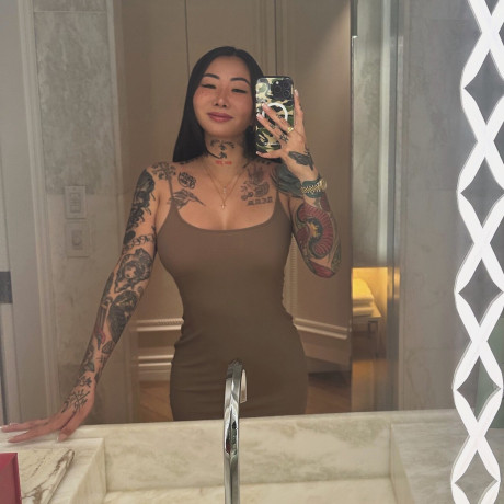 Tattooed oriental whore broad Sayless Savage takes selfies in undergarment and swimwear