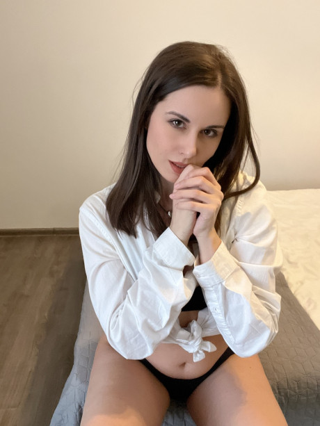 Sexy brunette young Alina Berryy teases with her cleavage and monstrous booty