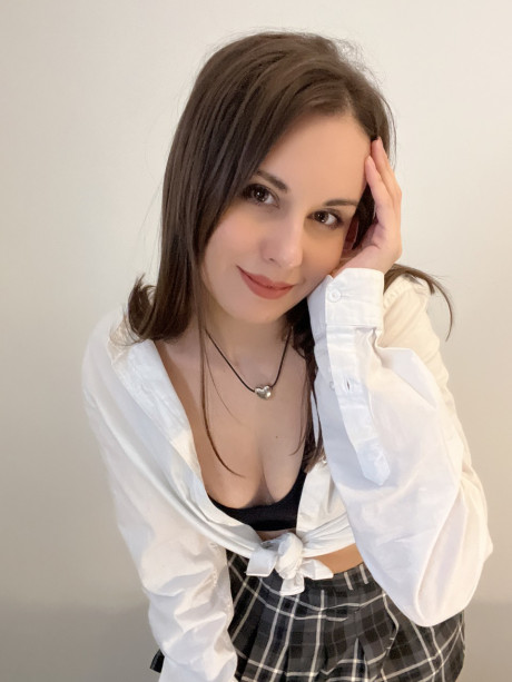 Sexy brunette young Alina Berryy teases with her cleavage and monstrous booty
