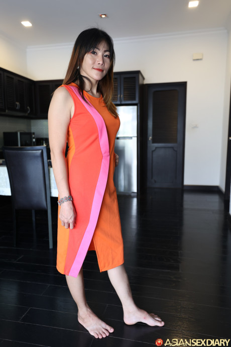 Hot asian MILF in a summer dress Yumi blows & rides a stud in POV