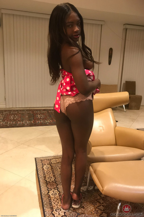 Little Afro-American teen Noemie Bilas shows her tits & choco holes in a solo