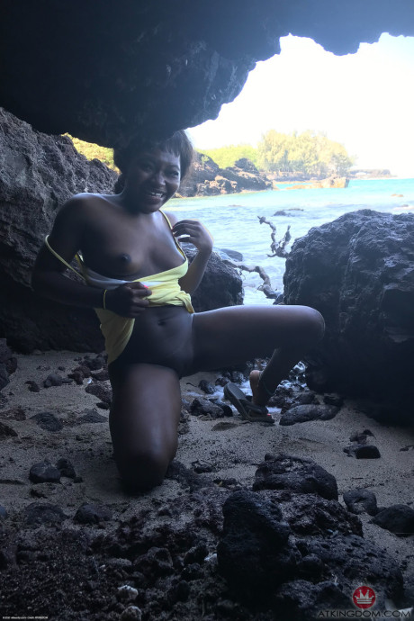 Little Afro-American teen Noemie Bilas shows her tits & choco holes in a solo