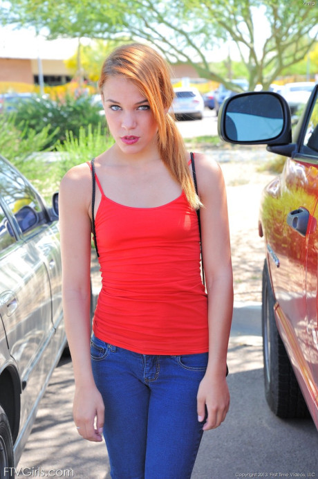 Skinny Anita slowly losing her outfit to pose nude in the middle of a road