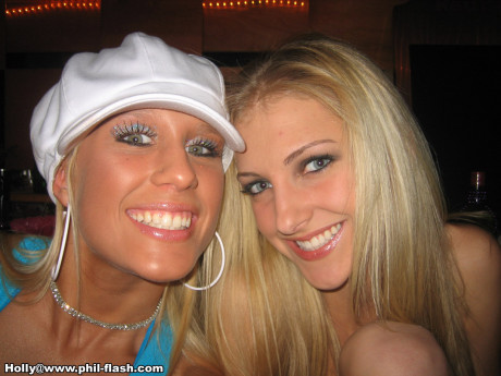 Amateur skanks fool around with their clothes on in candid action