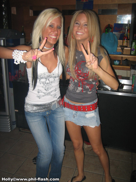 Amateur skanks fool around with their clothes on in candid action