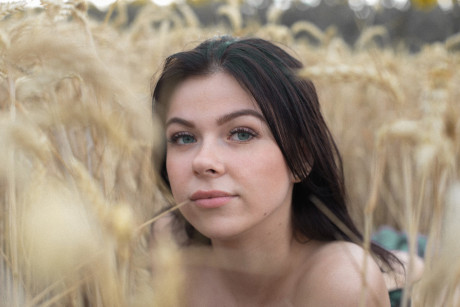 Breathtaking amateur babe Lyalya massages her big boobies in a wheat field