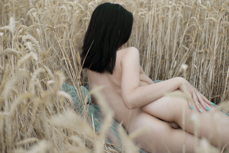 Breathtaking amateur babe Lyalya massages her big boobies in a wheat field