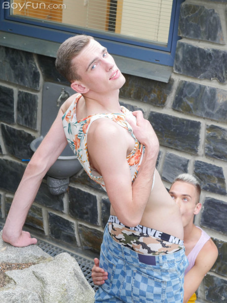 Pretty boys have anal sex on a sofa before swallowing each other's huge penii