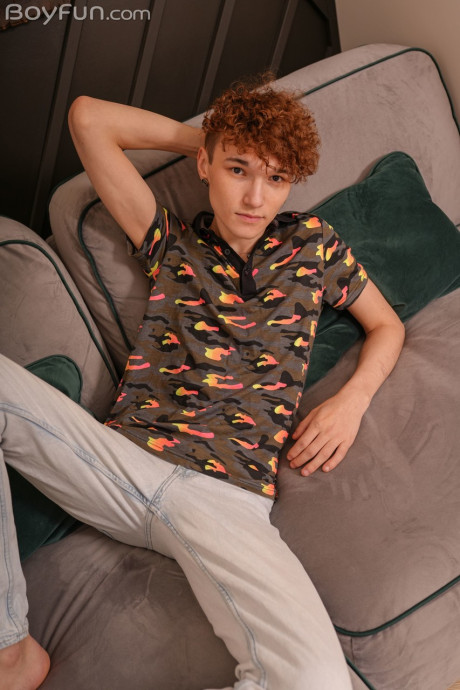 Adorable curly-haired gay Adam Keller shows his skinny body and masturbates