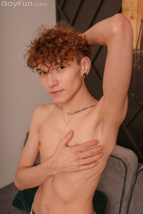 Adorable curly-haired gay Adam Keller shows his skinny body and masturbates