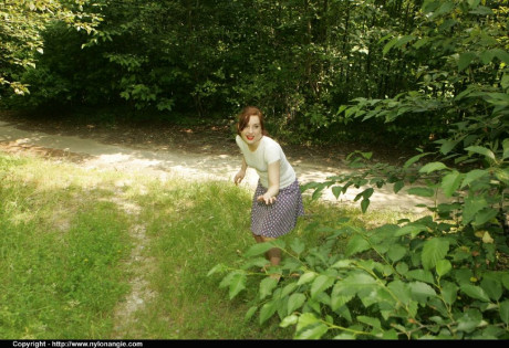 Stupendous fetish MILF in pantyhose slipping off her clothes outdoor