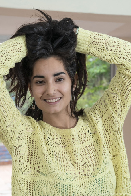 Brunette babe Tiffany shows off her small titties and her bushy vagina