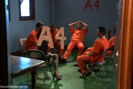 Ebony haired teenie Tegan Tate gets gangbanged by several horny inmates