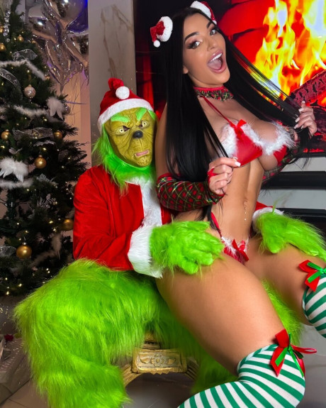 Hot MILF Nadine Kerastas teases with her giant melons in charming undies at Xmas