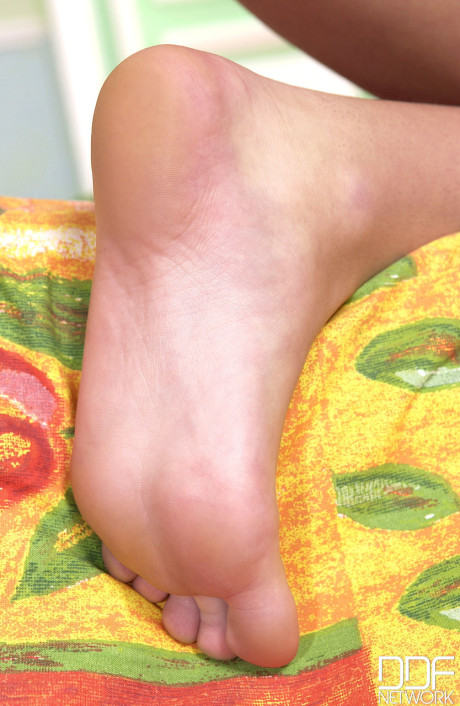 Sleazy Czech MILF Dasha gives a sockjob and receives cum on her feet