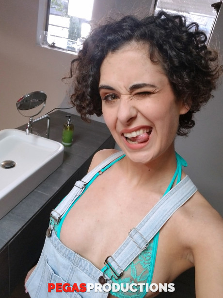 Curly-haired nerd Victoria Brennan gets butt poked in the bathroom