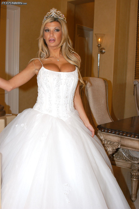 Ravishing bride Kendall Brooks teases with plentiful cleavage in wedding gown