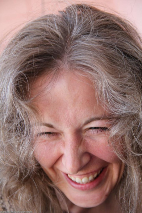 Tall Caucasian grandmother Olga pours water all over her boobs & fingers her cunt