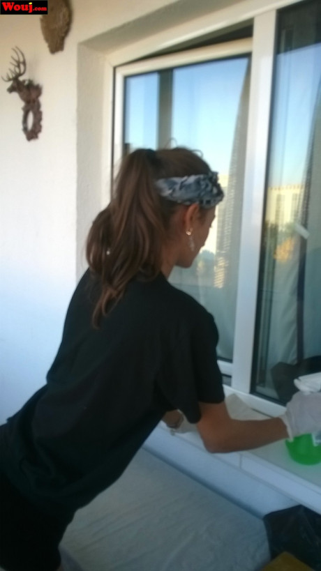 Lovely housewife WouJ flaunts her enormous ass while cleaning the windows outdoors