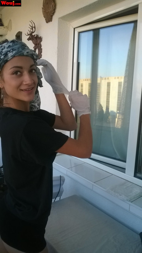 Lovely housewife WouJ flaunts her enormous ass while cleaning the windows outdoors