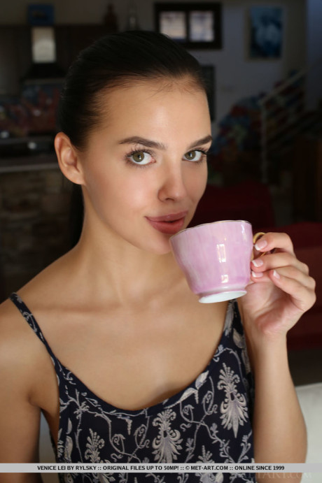 Exotic young Venice Lei is ready for naked posing after her morning coffee