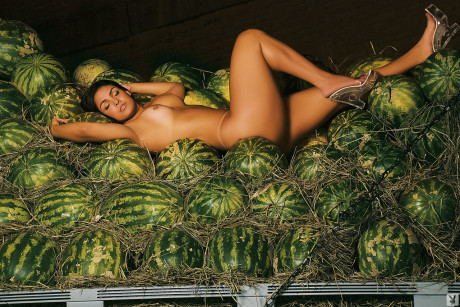 Voluptuous Brazilian Andressa Soares drips melon juice on her massive juicy boobies