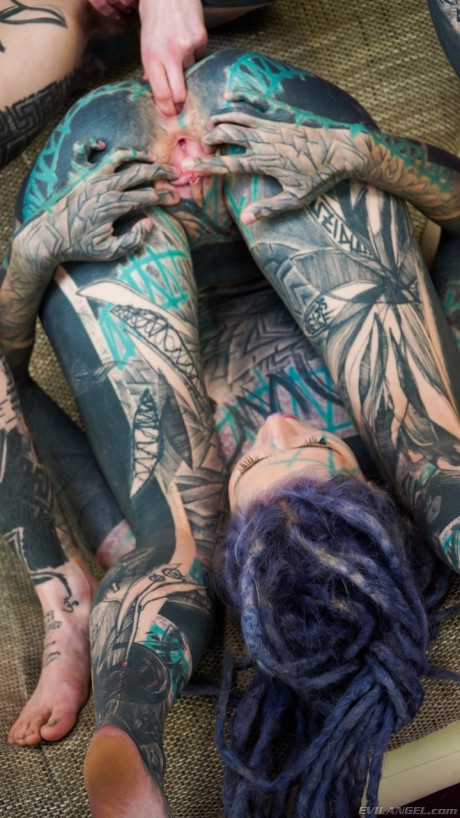 Heavily tattooed lesbians Anuskatz & Ceci Milkymouzz slip fists into assholes