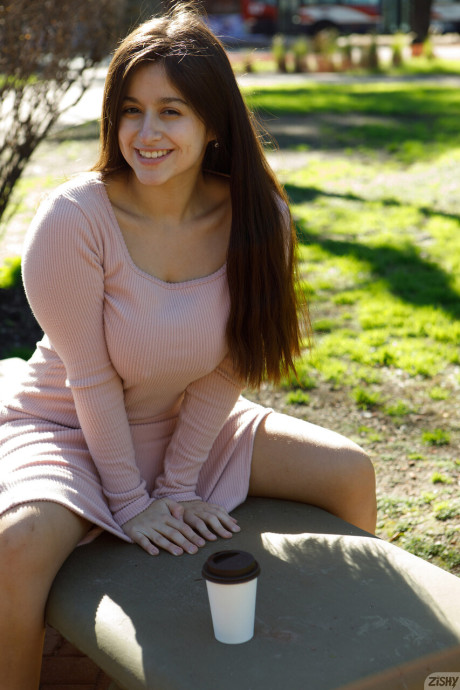 Wild brunette amateur Clara Tribech shows her enormous titties outdoors