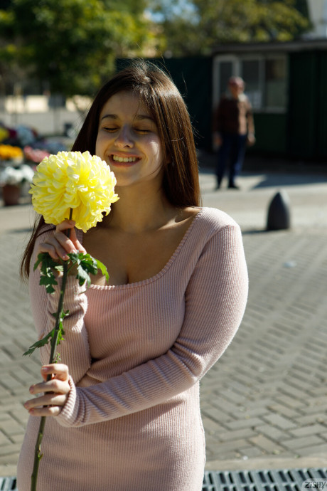 Wild brunette amateur Clara Tribech shows her enormous titties outdoors