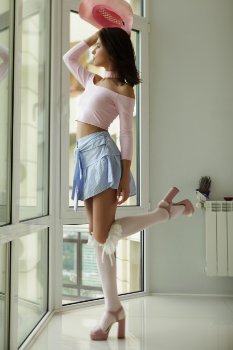 Lovely amateur glamour slut girl lady Rise poses erotically clothed flashing her panties