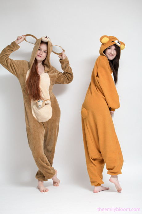 Charming fresh teen Emily and her pal doff their onsies to show hot asses naked