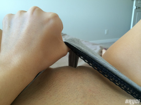 Amateur female Bryci snaps selfies while she fools around with her vagina
