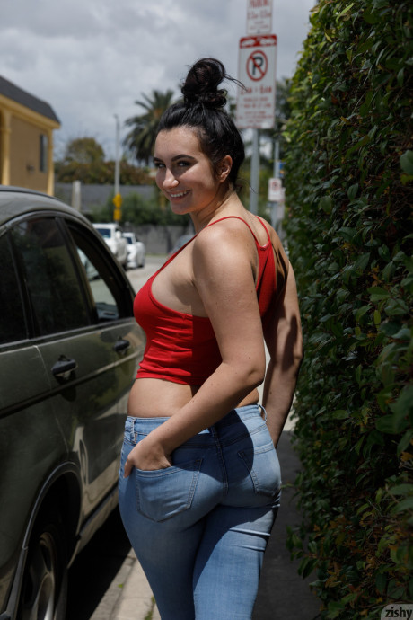 Dirty amateur babe Sidney Alexis exposes her attractive yummy huge juggs in public