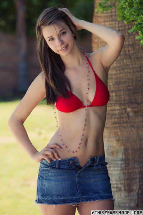 Gorgeous whore girl girl Penny Kate undresses in a backyard location