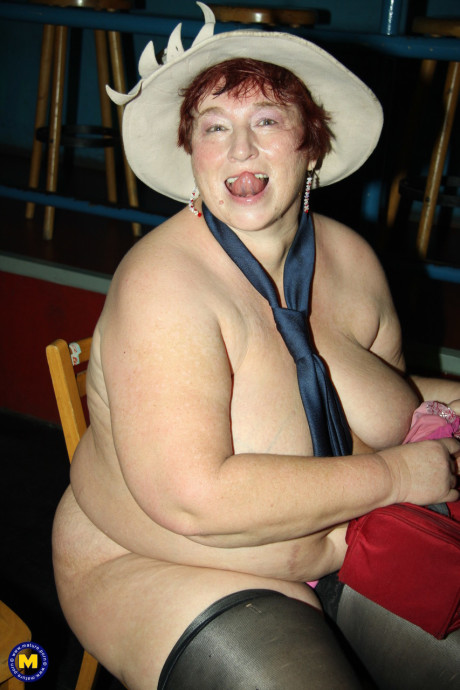 Chubby grannies and thin teens stripping and posing in a strip bar