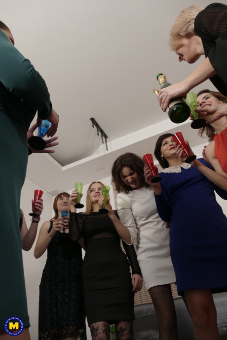 Nine horny European women sharing one monstrous schlong in a frenzied sex party