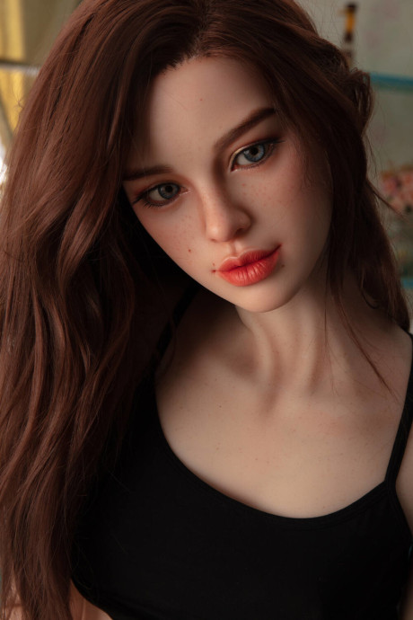 Pretty realistic sex doll shows off her flawless body in ebony undies