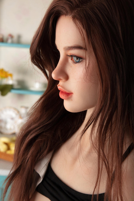 Pretty realistic sex doll shows off her flawless body in ebony undies