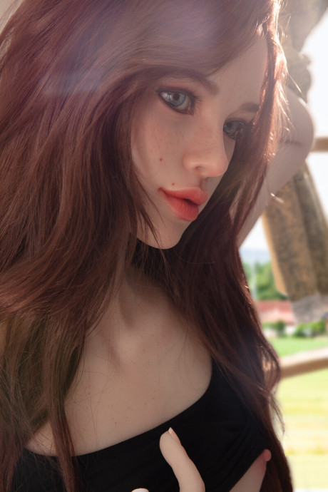 Pretty realistic sex doll shows off her flawless body in ebony undies