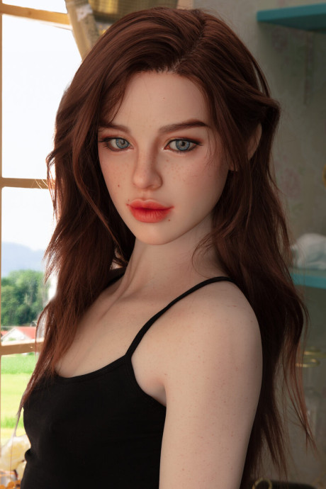 Pretty realistic sex doll shows off her flawless body in ebony undies