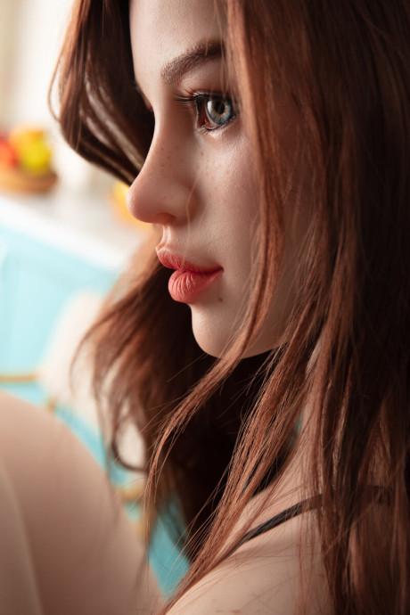 Pretty realistic sex doll shows off her flawless body in ebony undies