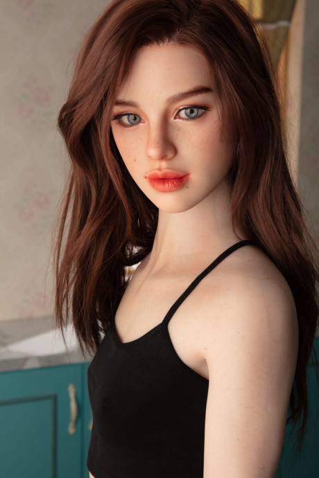 Pretty realistic sex doll shows off her flawless body in ebony undies